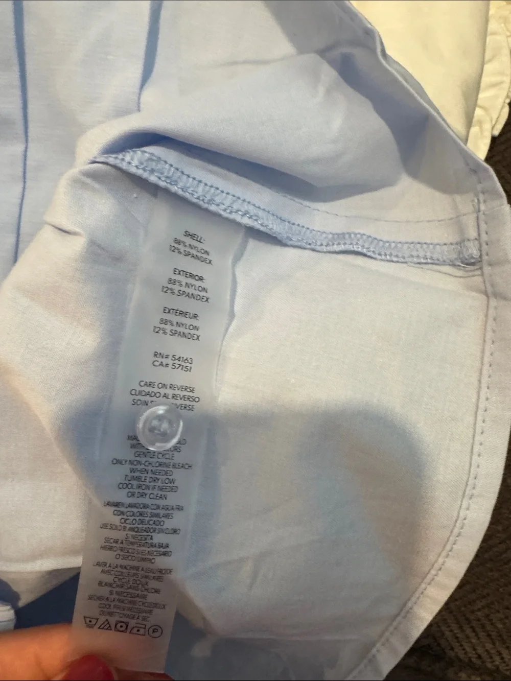 Karl Lagerfeld Light Blue Ruffled Sleeveless Top ( come with sets)